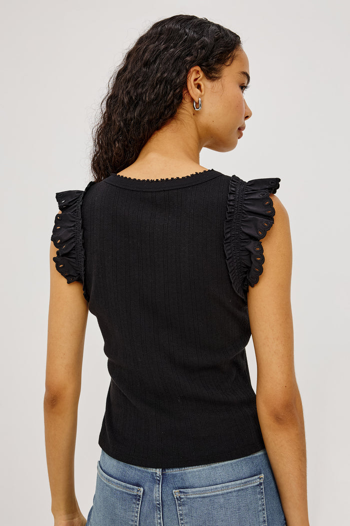 Giovanna Top in Soft Pointelle Cotton With Scoop Neck, Scalloped Trim, Ruffled Flutter Sleeves in Black Colorway - Upper Body Back View Featured on Model