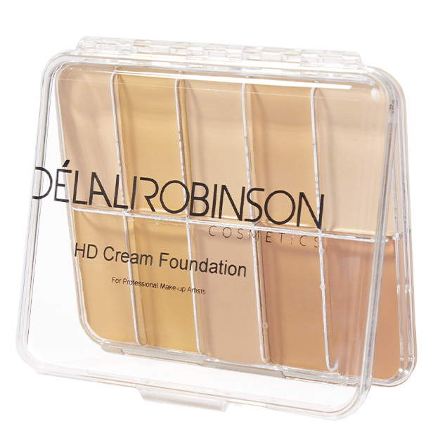 A clear palette containing various shades of liquid foundation, segmented into individual wells, with a brand logo at the bottom.