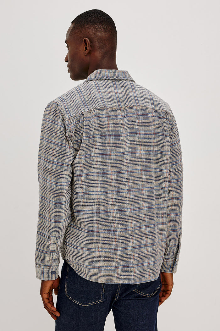 Warren Overshirt in Soft Textured Chenille Cotton With Relaxed Fit, Point Collar, Button Front, Dual Chest Flap Pockets, and Shirttail Hem in Oat Meridian Chenille Colorway - Upper Body Back View Featured on Model