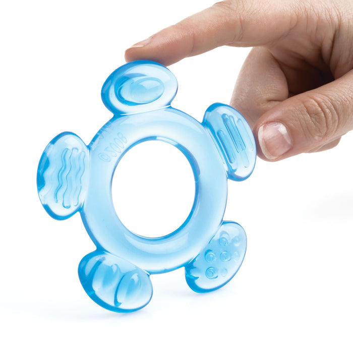 A hand holds a blue, turtle-shaped teether from the 3 Step Baby Teether Set, featuring textured silicone areas for babies to chew on, set against a white background.