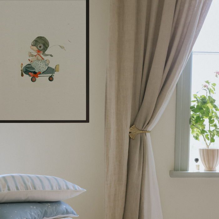 Art work hanging on a wall of gooseling in a plane