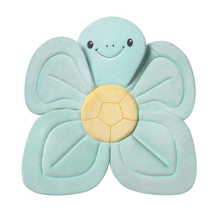 The Baby Bath Sink & Tub Cushion is a plush mat shaped like a smiling sea turtle, with a round yellow shell center and four teal flipper-like edges—perfect for making sink or tub bath time fun and comfy.