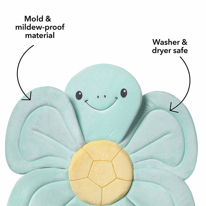 The Baby Bath Sink & Tub Cushion is a smiling, soft seafoam green octopus mat with a yellow underside. It's mold and mildew-proof, washer and dryer safe—perfect for your baby's bath time.