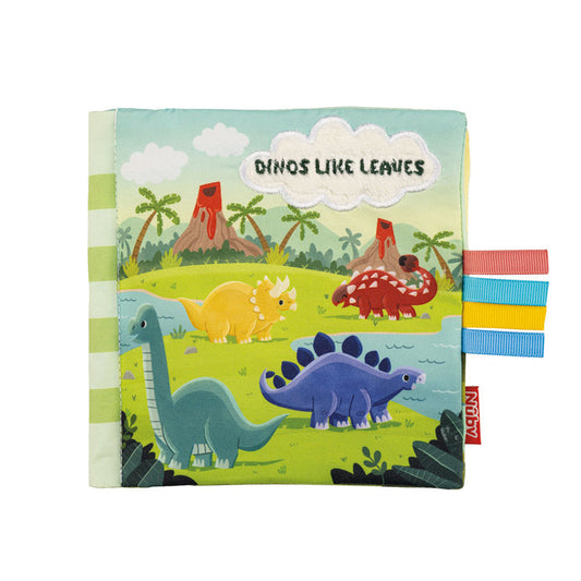 The Baby Sensory Book | Dino is a soft fabric play book featuring cartoon dinosaurs, volcanoes, palm trees, colorful ribbon tags, and a green scenic cover—ideal for tummy time or as a Montessori-inspired baby book.