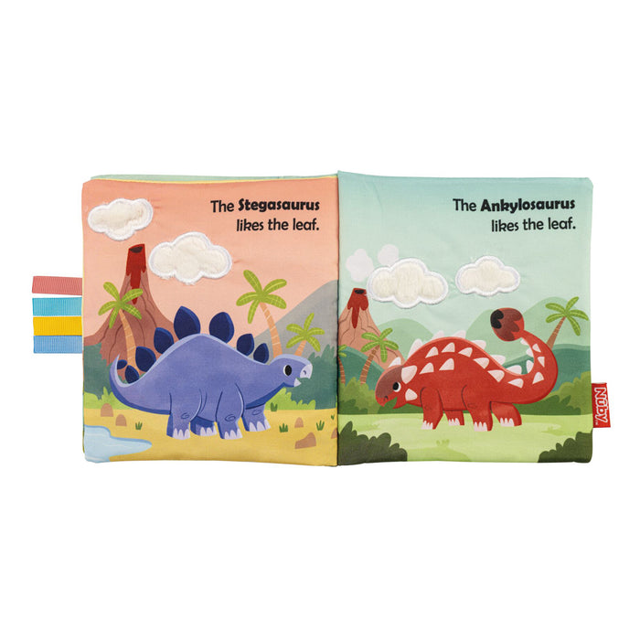 Illustration of the Baby Sensory Book | Dino featuring a blue Stegosaurus and red Ankylosaurus in a prehistoric scene, each eating a leaf. Great as a tummy time toy or Montessori baby book. Text: The Stegosaurus likes the leaf. The Ankylosaurus likes the leaf.