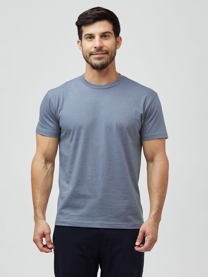 Joey is 5'7" and wears M Short # Short Tees in Wedgewood Blue at FCT