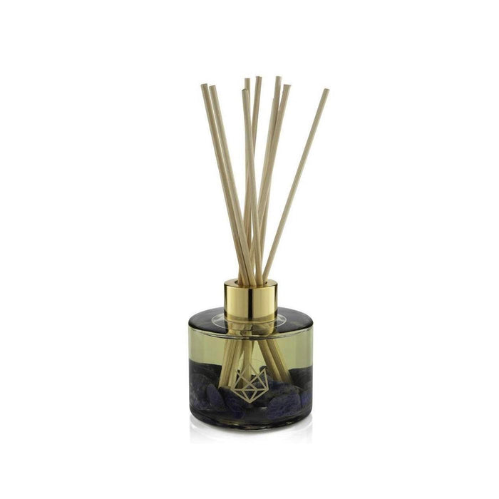 Calm Reed Diffuser | Aluminate Life with natural wooden reeds in a translucent smoky glass container accented with gold detailing, offering a serene and elegant wellness aroma experience.