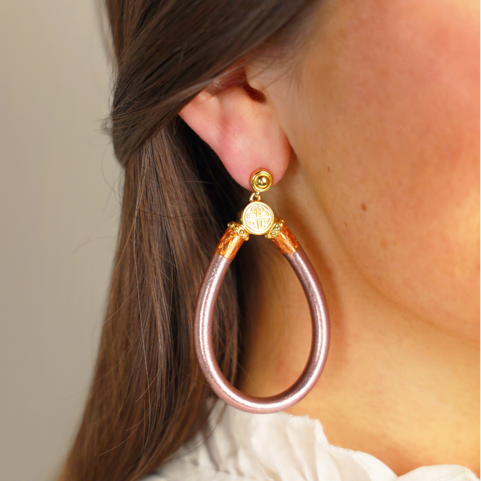 a close up of a woman's ear