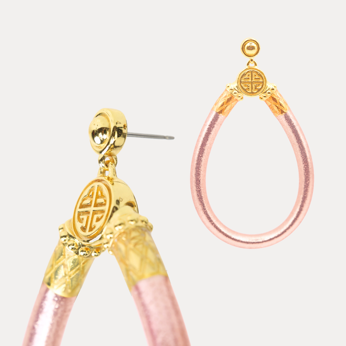 a close up of a pair of earrings
