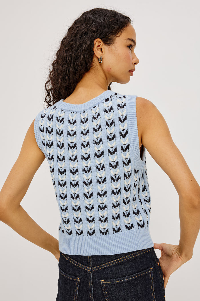Chance Vest in Cable Knit With Scoop Neckline, Sleeveless Design, Front Button Closures, and Relaxed Fit in Sky Blue Colorway - Upper Body Back View Featured on Model
