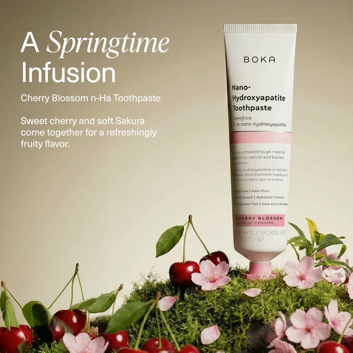Boka Cherry Blossom n-Ha Toothpaste with cherry and sakura elements on a natural background