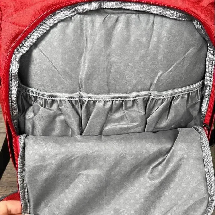 Deep red Cotton Road nappy bag backpack with front zip and side pockets