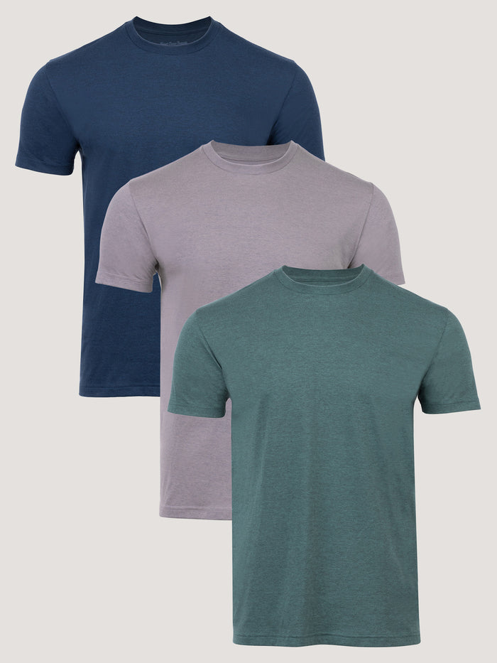 Three plain cross-dye t-shirts in blue, gray, and green
