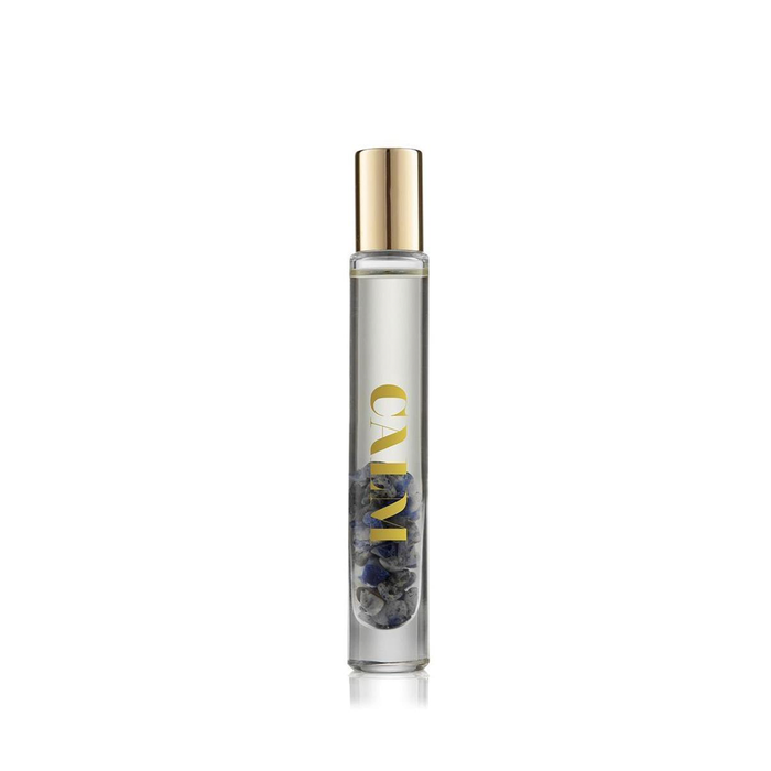 Clear glass roll-on vial with gold cap containing natural stones and liquid, labeled CALM, part of the Defense Essential Oil Vial | Aluminate Life wellness collection.