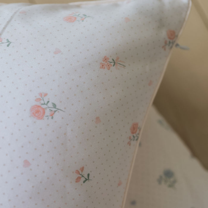 Close up of toddler pillow in Ditsy Floral - Pink.