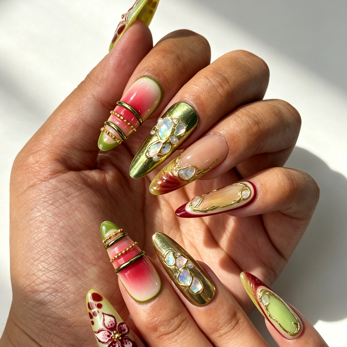 Nature-inspired fern green red floral press-on nails on hand