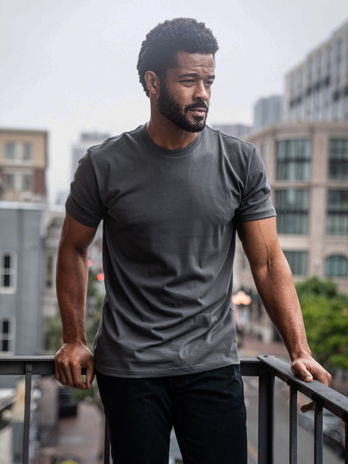 Jarrett is 6', 168lbs and wears a size M # Graphite Crew Neck Lifestyle Size Medium | Fresh Clean Threads