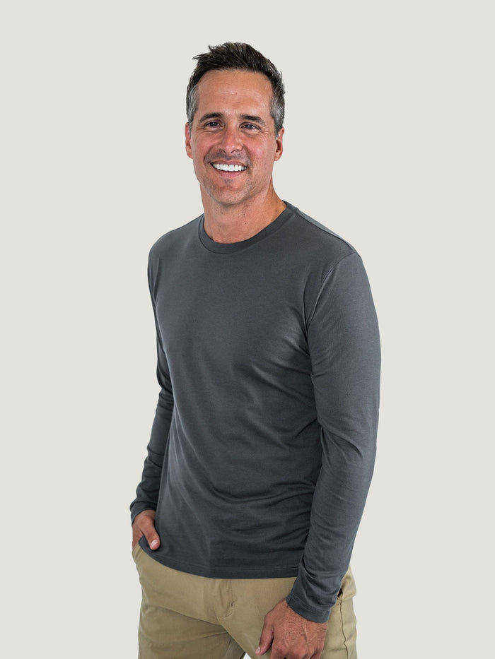 Ben is 6'1, 180lbs and wears a size M # Graphite Long Sleeve Crew Neck Studio Size Medium | Fresh Clean Threads