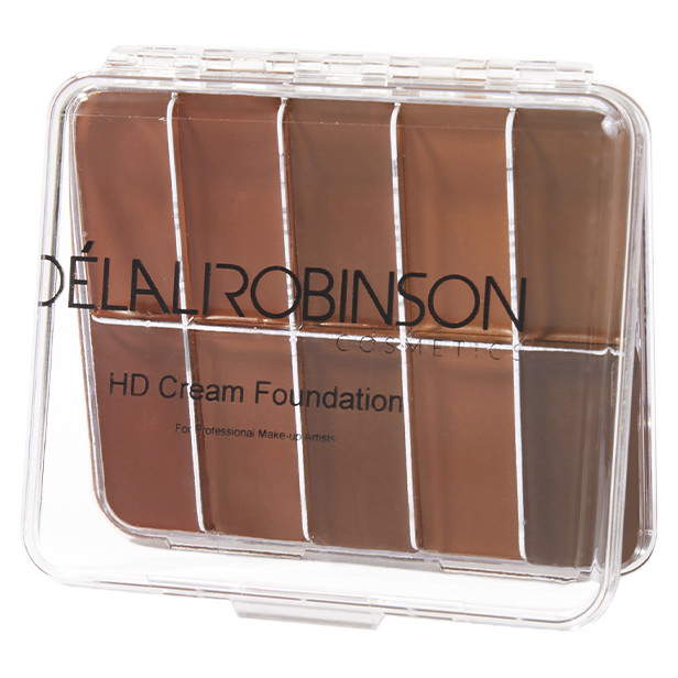 A clear palette containing various shades of liquid foundation, segmented into individual wells, with a brand logo at the bottom.