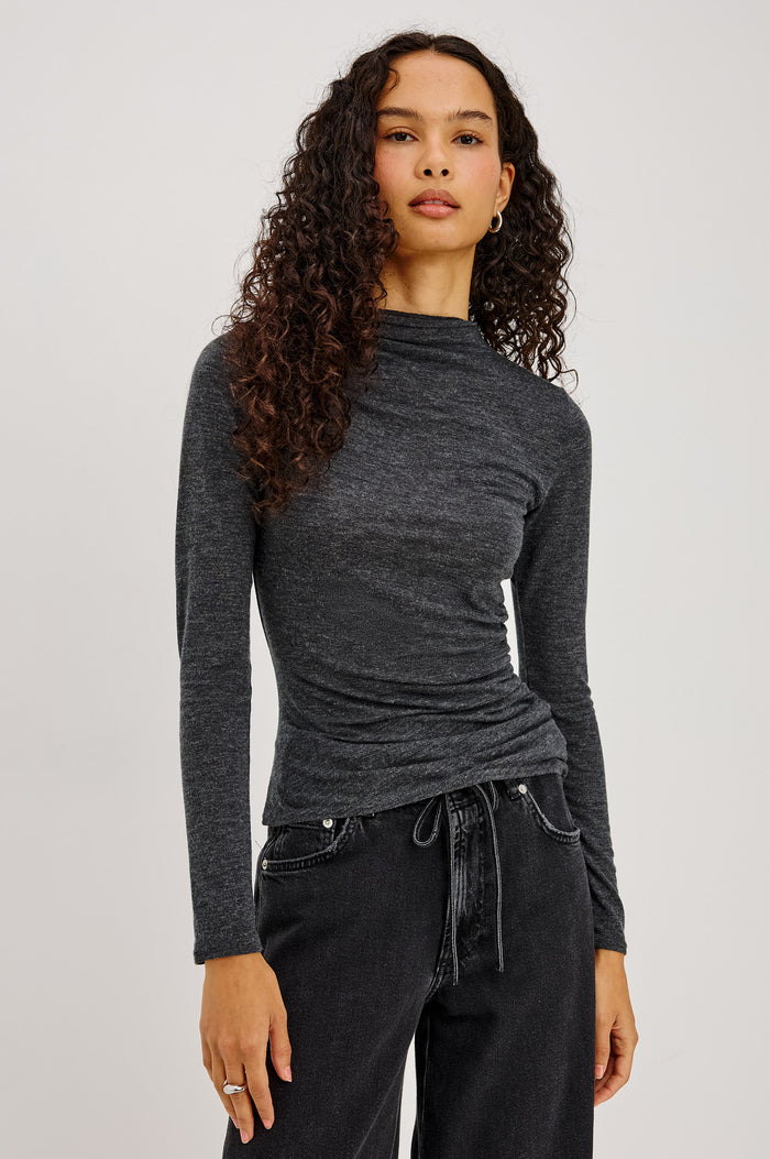 Joelle Top in Soft Jersey With High Funnel Neckline, Long Sleeves, Self-Lined Body, and Asymmetric Ruching at Shoulder and Waist in Charcoal Colorway - Upper Body Front View Featured on Model