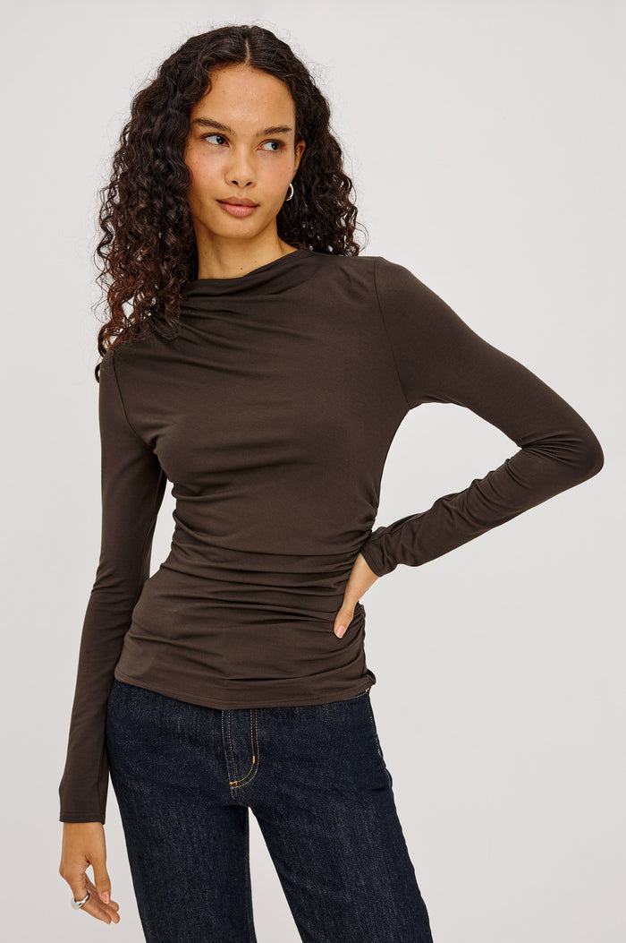 Joelle Top in Soft Jersey With High Funnel Neckline, Long Sleeves, Self-Lined Body, and Asymmetric Ruching at Shoulder and Waist in Black Onyx Colorway - Upper Body Front View Featured on Model