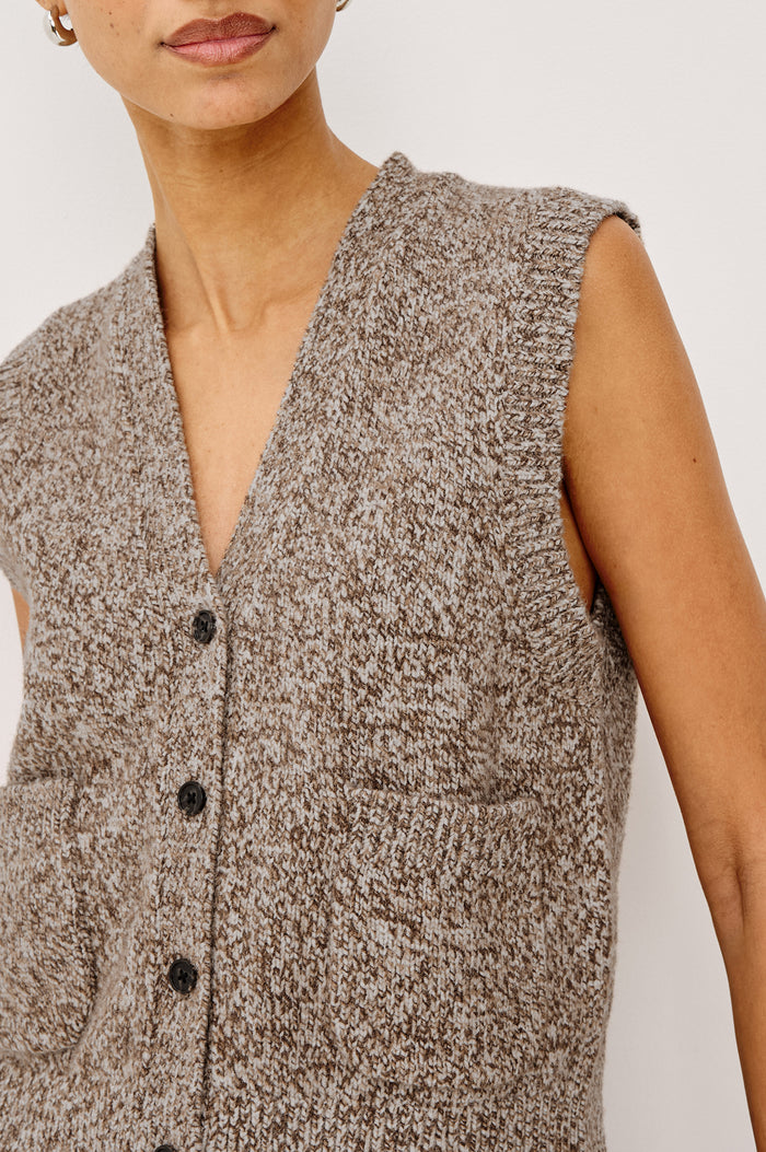 Kasmir Sleeveless Vest in Recycled Poly Knit Blend With V-Neckline, Front Buttons, and Front Patch Pockets in Brown Melanga Colorway - Upper Body Front View Featured on Model