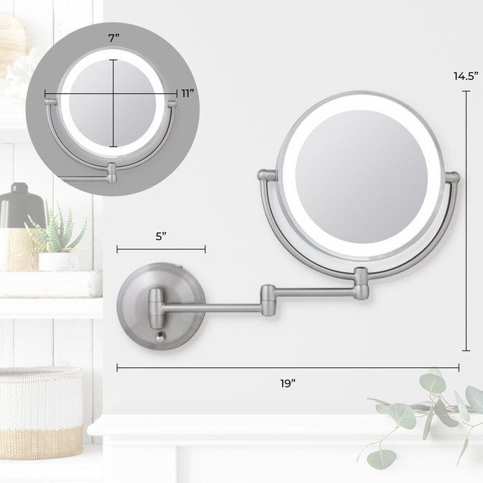 Zadro LEDW410 705004419475 environment photo front with dimensions, lighted wall mounted makeup mirror with magnification & extendable arm in front of a real life setting