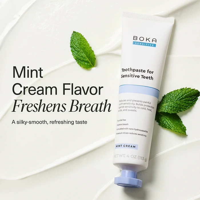 Boka Mint Cream toothpaste tube with mint leaves on a white background