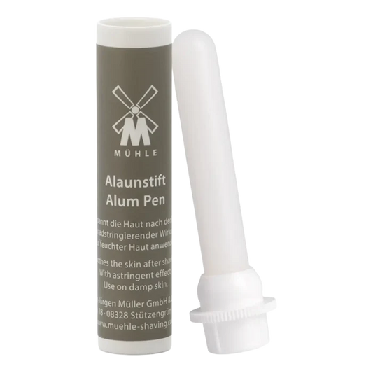 Mühle Alaunstift i hvit alum med mørkegrå beholder og logo