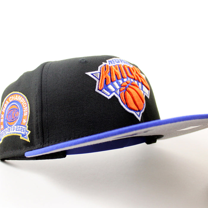 New York Knicks Champions Patch New Era 9Fifty Snapback Hat (Black Royal Blue Gray Under Brim)
