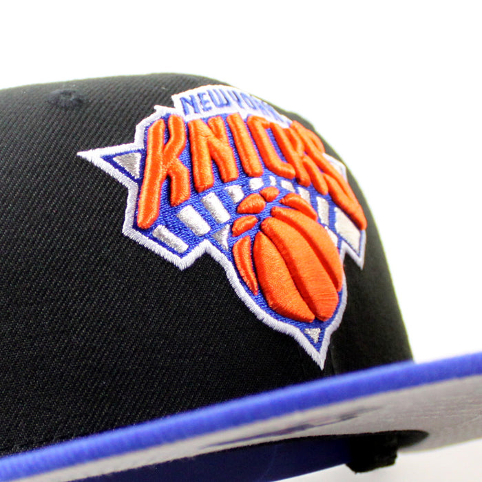 New York Knicks Champions Patch New Era 9Fifty Snapback Hat (Black Royal Blue Gray Under Brim)