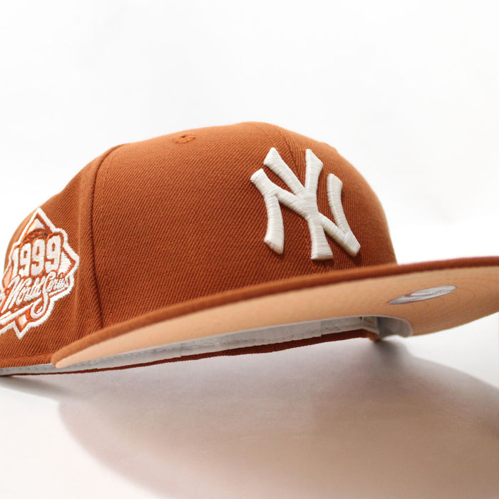 New York Yankees 1999 World Series New Era 59Fifty Fitted Hat (Glow in the Dark Rust Orange Pink Under Brim)