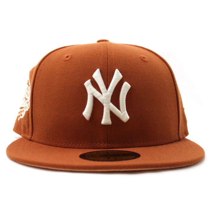 New York Yankees 1999 World Series New Era 59Fifty Fitted Hat (Glow in the Dark Rust Orange Pink Under Brim)