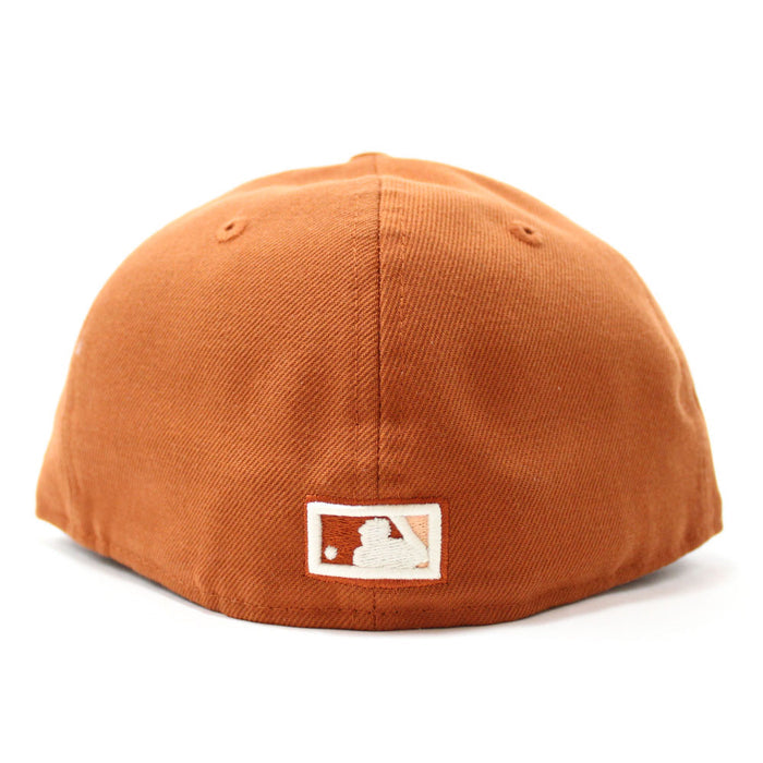 New York Yankees 1999 World Series New Era 59Fifty Fitted Hat (Glow in the Dark Rust Orange Pink Under Brim)