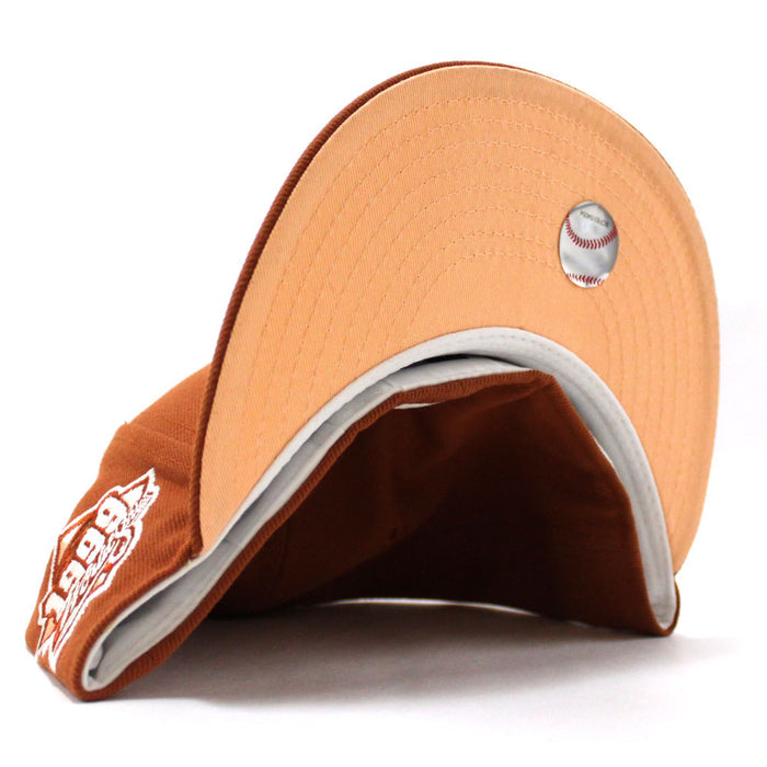 New York Yankees 1999 World Series New Era 59Fifty Fitted Hat (Glow in the Dark Rust Orange Pink Under Brim)