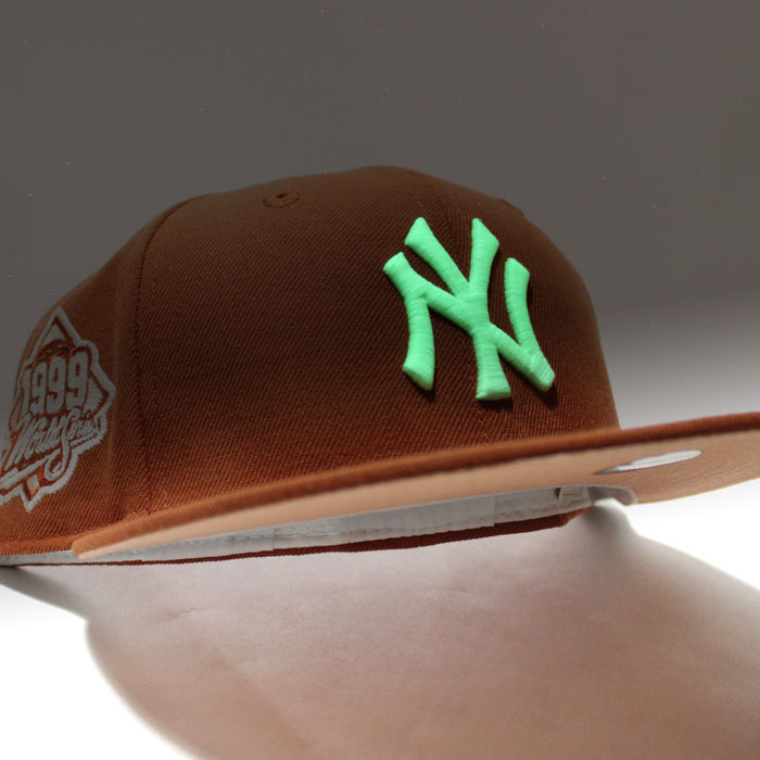 New York Yankees 1999 World Series New Era 59Fifty Fitted Hat (Glow in the Dark Rust Orange Pink Under Brim)