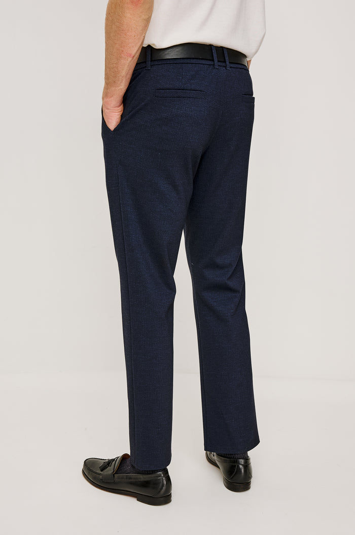 Olivier Pant With Front Belt Loops, Side Pockets, Pintuck Detailing in Navy Colorway - Full Body Back View Featured on Model
