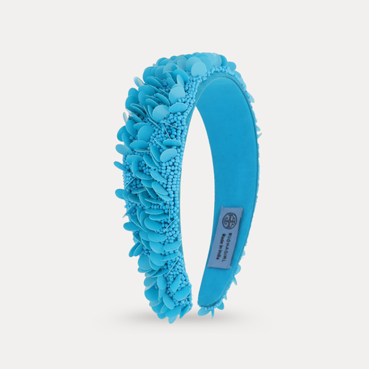 a headband with blue flowers