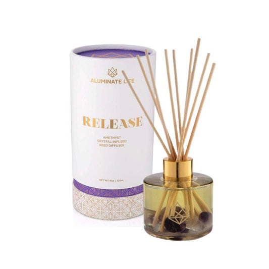 Release Reed Diffuser | Aluminate Life featuring a glass container with natural reeds and amethyst crystal infusion, designed to promote wellness and create a calming ambiance.