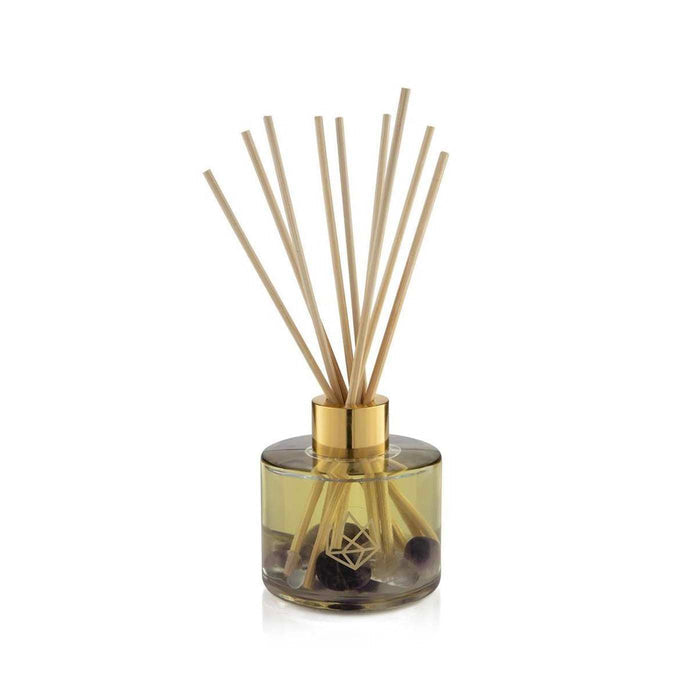 Release Reed Diffuser | Aluminate Life with natural wooden reeds in a transparent golden glass container, designed to enhance wellness and spa ambiance.