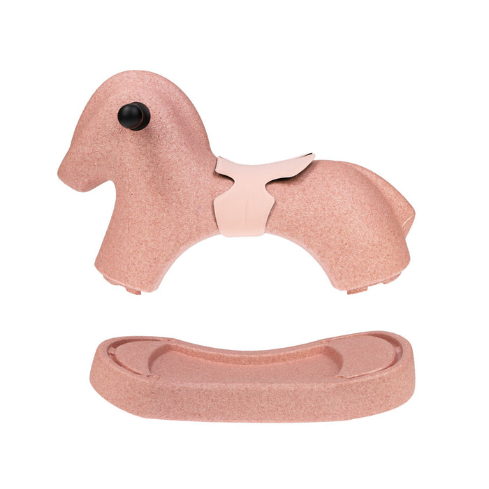 The Rock 'N Ride | Pink is a 3-in-1 ride-on toy horse for young kids, featuring a removable curved base and saddle for rocking or riding. The image displays the pink horse and its separate curved base.