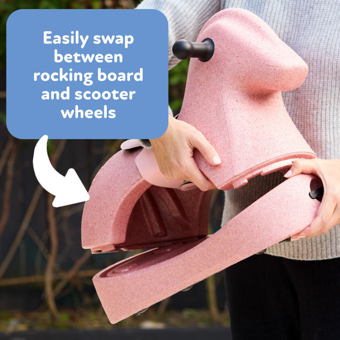 A person demonstrates swapping parts on the Rock 'N Ride | Sage, showing how to switch between a rocking board and scooter wheels. Text bubble reads: Easily swap between rocking board and toddler scooter wheels.