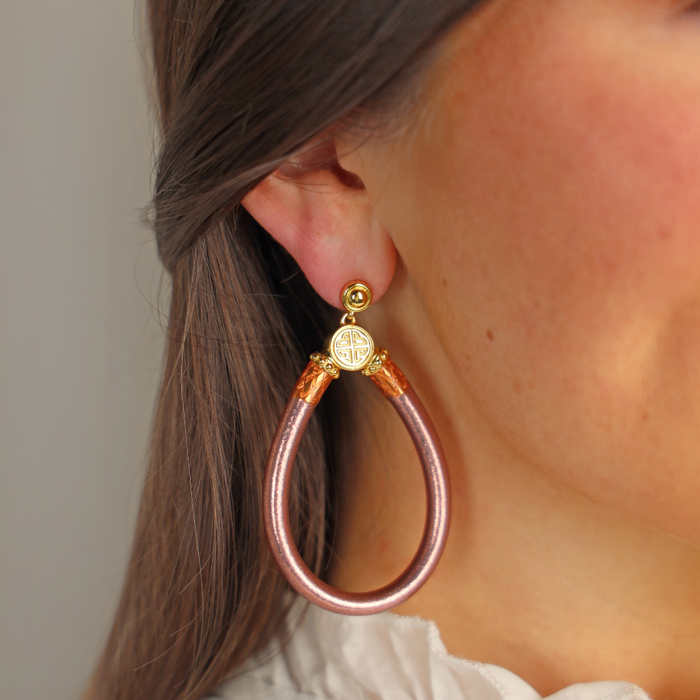 a close up of a woman's ear