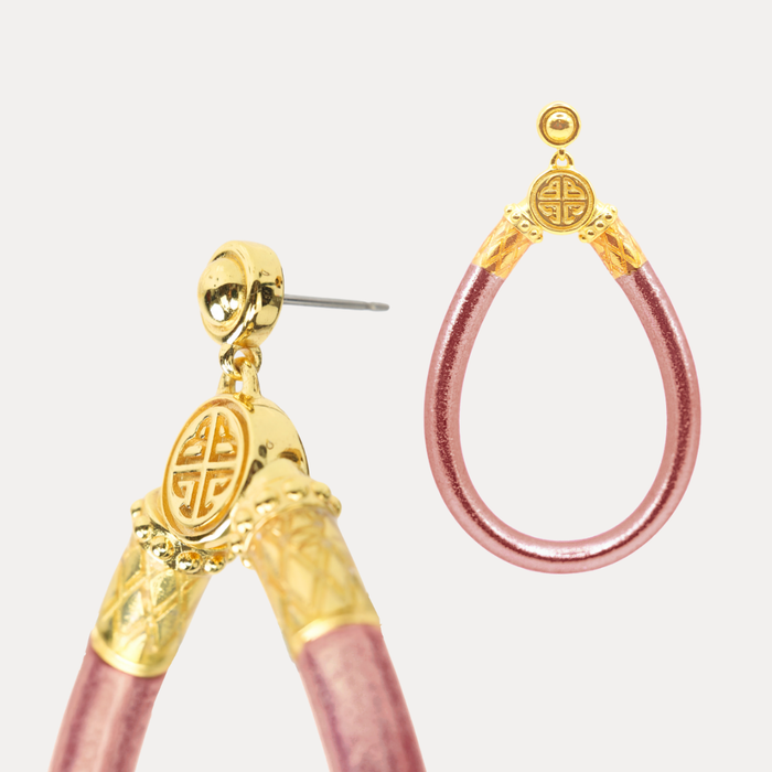 a close up of a pair of earrings