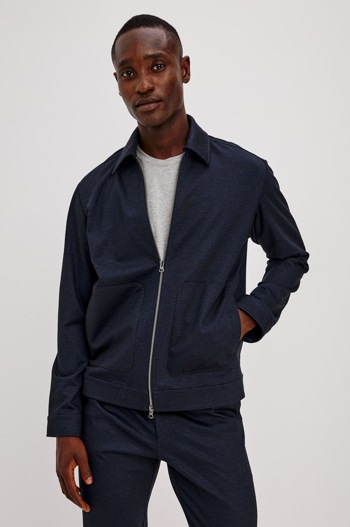 Shael Jacket in Stretch Ponte With Point Collar, Zip Front, and Double Welt Pockets in Navy Colorway - Upper Body Front View Featured on Model