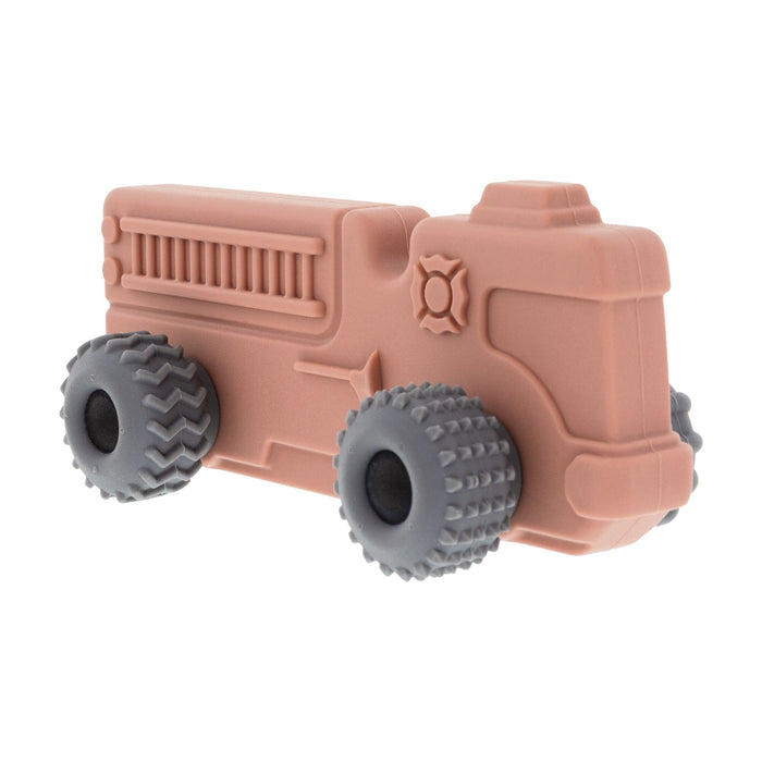 The Nuby Silicone Vehicle Teether Toy | Fire Engine is a soft, smooth silicone baby teether in a fire engine shape with textured wheels, ideal for soothing sore gums.