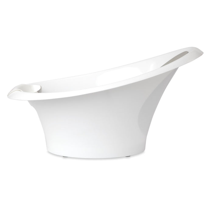 A modern, white, freestanding bathtub with a high backrest and curved design—perfect for pairing with the Sit and Bathe Compact Bathtub for comfortable baby bath time.