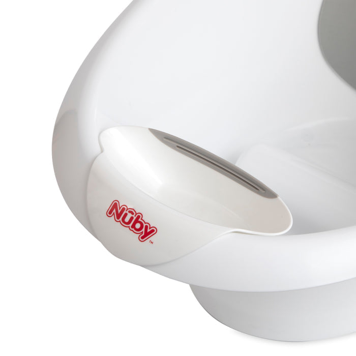 Close-up of the Sit and Bathe Compact Bathtub with a built-in soap holder and red Nûby logo, ideal for gentle baby bath support.