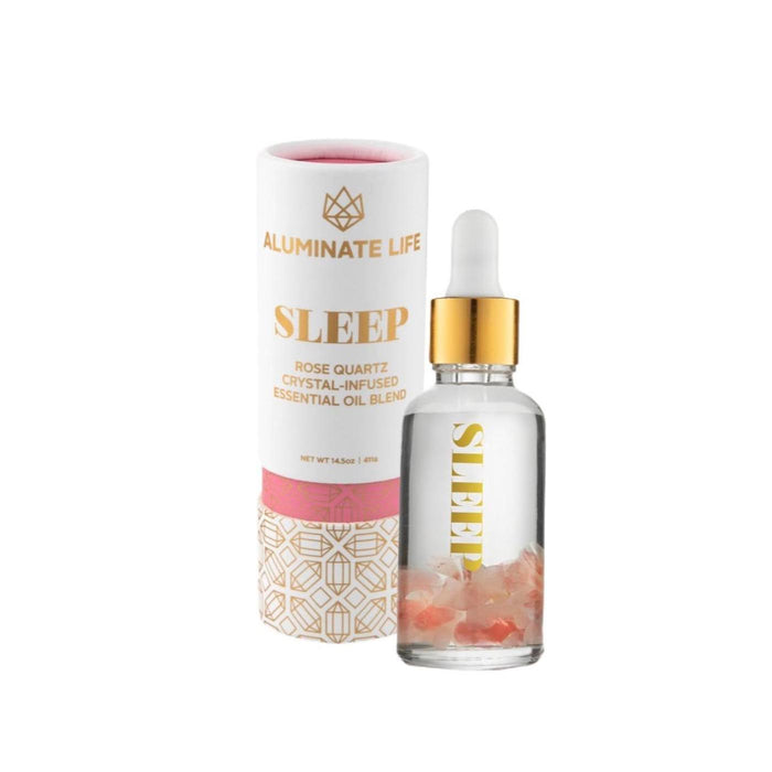 Sleep Essential Oil Vial | Aluminate Life featuring a dropper bottle with rose quartz crystal-infused essential oil blend designed to promote relaxation and wellness.