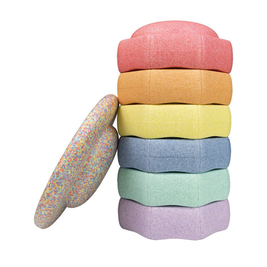 The StepPebbles and FREE Balance Board | Pastel features six pastel foam stepping stones and a speckled balance board, perfect for indoor or outdoor kids' balance activities.